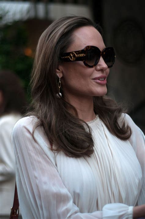 Angelina jolie is using her platform to speak out about turmoil in afghanistan and the women and children now in grave danger. ANGELINA JOLIE Out and About in Paris 07/08/2019 - HawtCelebs
