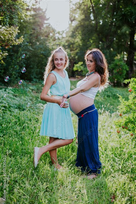 Pregnant Mother And Babe Happy In The Field Stock Photo Adobe Stock
