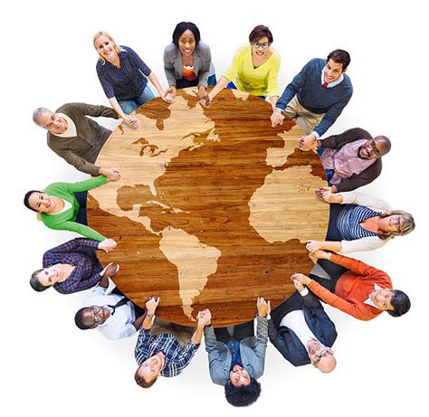 Group Of People Holding A World Globe Stock Photos Pictures And Royalty