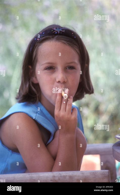 Young Girl Pretending To Smoke Stock Photo Alamy