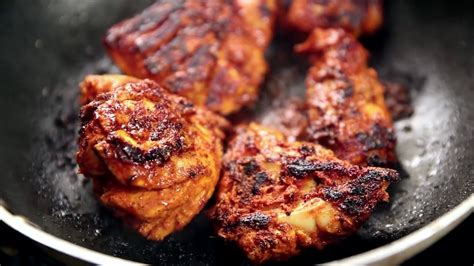 To prevent the chicken from burning, always glaze the pan with ghee or oil. Tandoori Chicken without Oven Recipe - YouTube
