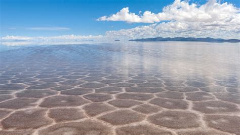 Reflection In The Water After Rainfall Salt Desert Salar De Uyuni
