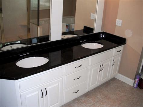 Black granite tiles can also create interesting designs in your kitchen. 7-2-12 BLACK GALAXY Granite Colors for white Cabinets ...