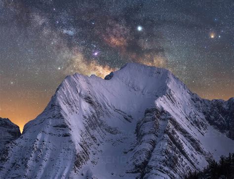 Amazing View Of White Snowy Mountain Range Under Incredible Night