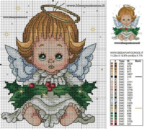 A Cross Stitch Pattern With An Angel On Its Chest And Holly Wreaths