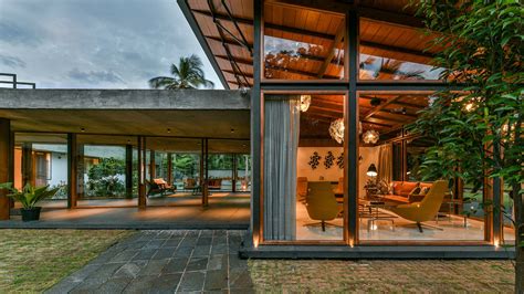 Kerala This Glass Bungalow Opens Up Views To A Rubber Plantation