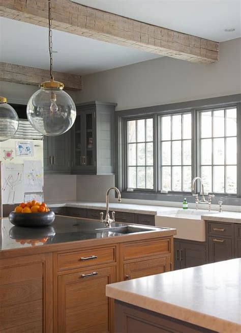 Shop our best selection of black kitchen islands & carts to reflect your style and inspire your home. Charcoal Gray Cabinets with Brown Red Stained Island ...