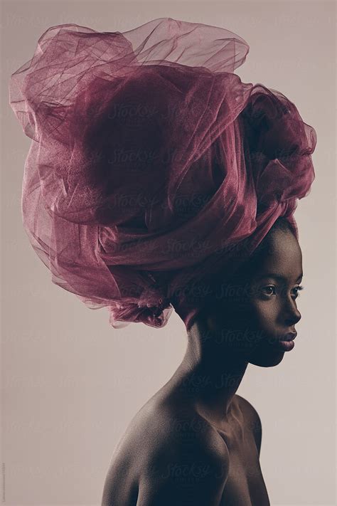 beautiful black woman with a turban stocksy united