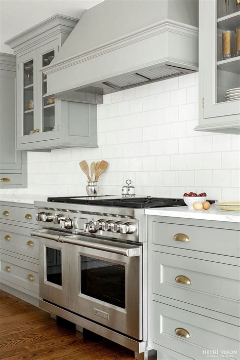 Shaker doors cut to the dimensions (height and width) you specify make it easy to replace. Heidi Piron Design and Cabinetry | Painted Gray with Brass ...