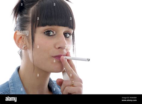 Pretty Young Woman Smoking Cigarette Stock Photo