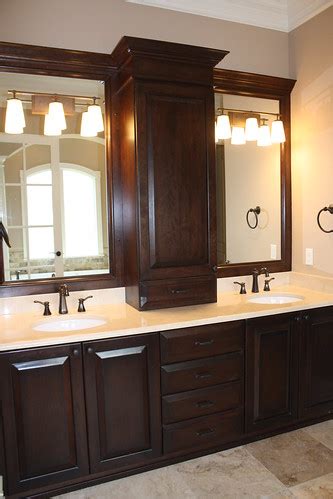 If you have a specific vanity color in mind, for example, a white bathroom vanity or black bathroom vanity, then you may be restricted to manufactured wood vanities. Master Bathroom Medicine Cabinet | heartofthehome | Flickr