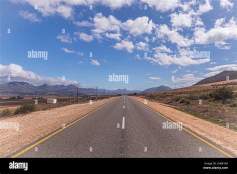 The Road Of Route 62 Through Karoo Landscape In South Africa Stock