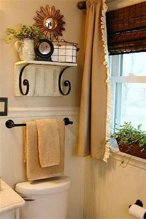 Air flows freely all around the shelf so your towels it's certainly not short on bathroom towel storage ideas, pun intended. 42 Awesome Bathroom Cabinet With Towel Rack Ideas (With ...