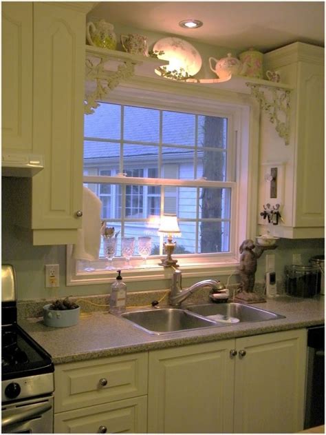 These windows can provide an inviting nook for decor and plants such as flowers and herbs. Kitchen Sink Shelf Over Window With Antique Brackets For ...