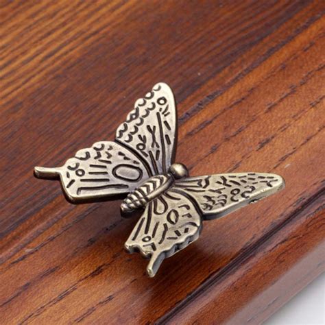 Shop home decorating with confidence & price match guarantee. Antique Greenish Bronze Color Butterfly Knobs Drawer Dresser Handle Pull Kitchen Cabinet Knobs ...