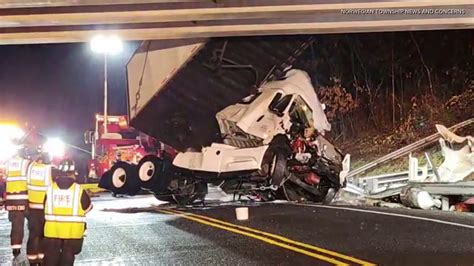 Tractor Trailer Crashes Hangs Off Bridge