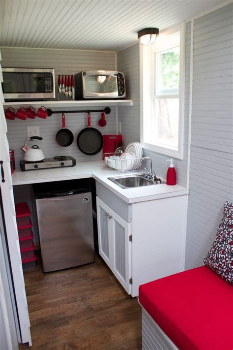 Get even more out of your tiny house kitchen by having a hidden sink and toekick drawers. 25 Impressive Small Kitchen Ideas - Page 4 of 4