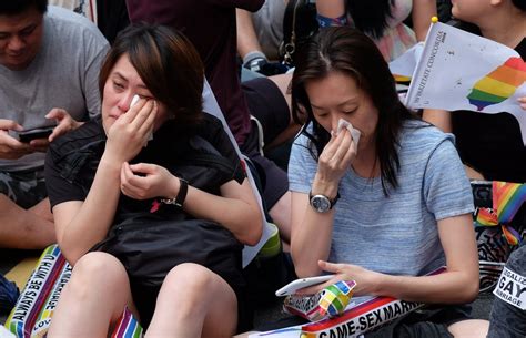 Two People Start Crying As The Courts Ruling Is Announced Taiwan