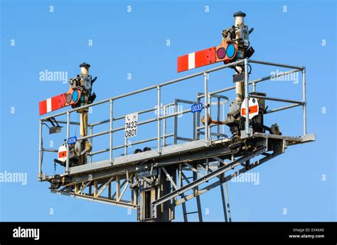 Old Style Mechanical Semaphore Stop Signals On A British Railway Both