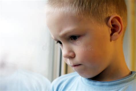 Sad Boy At The Window Loneliness And Depression Stock Photo Image Of