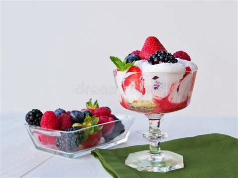 Strawberry Raspberry Blackberry Trifle Topped With Whipped Cream