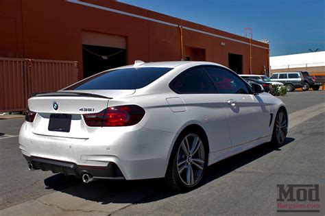 Has anyone had any success with fitting a m4 style spoiler/boot lip? BMW F32 M4 Carbon Fiber Trunk Spoiler
