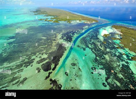 Aerial View Of Tidal Channel In Coral Which Feeds Central Lagoon