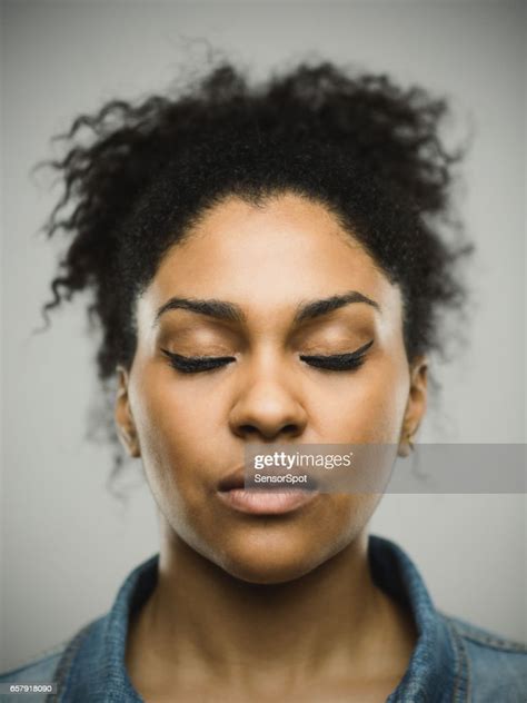 Closeup Portrait Of Real Young Black Woman With Eyes Closed High Res