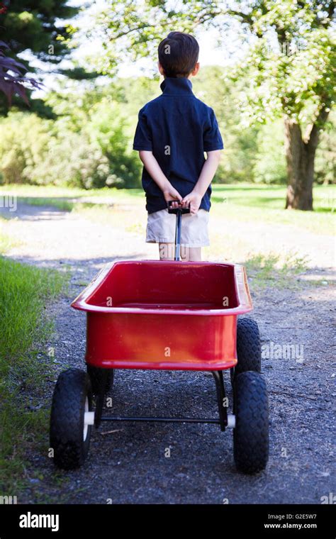 Boy Pulling Wagon High Resolution Stock Photography And Images Alamy