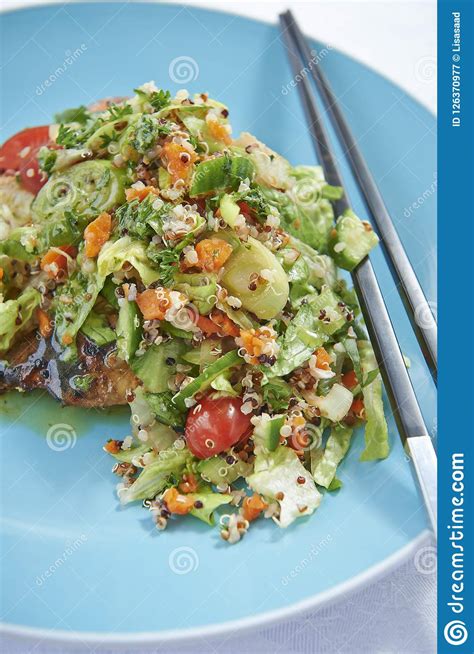 Grilled Fish Covered In Salad With Chopsticks Stock Image Image Of