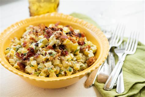 There's nothing as yummy and easy as a good potato salad, and this one is extra special with green apples, raisins and walnuts for some crunch! Egg and Potato Salad with Bacon Recipe — The Mom 100