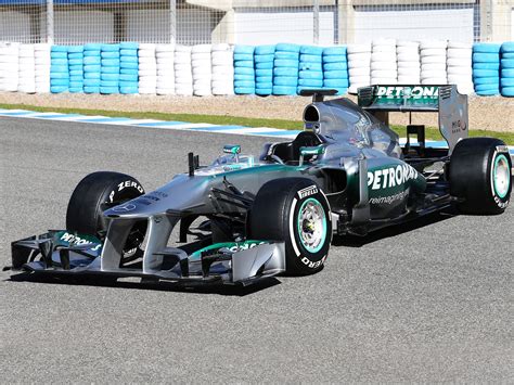 It can be steamy and sweltering at races held in the summer but cold, damp. Mercedes F1 W 04 | Mercedes, Mercedes amg, Point blank
