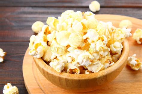 Salted Popcorn In A Wooden Bowl On A Wooden Table Stock Image Image