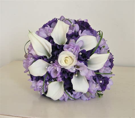 Thousands of tiny white flowers suspended like a mist on thin stems make baby's breath an attractive choice for floral arrangements.perfect for your wedding day, craft projects or just make your own beautiful display.increase more color and vitality to your life, make you have a good mood every day. Wedding Flowers Blog: Alannah's Purple Wedding Flowers ...