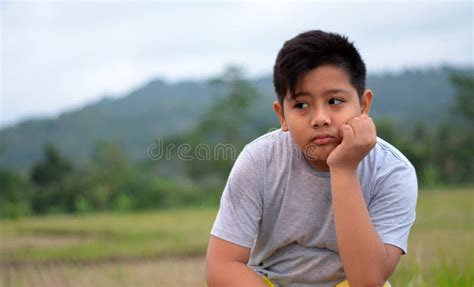 Indonesian Boy With Sad Expression Stock Photo Image Of Person