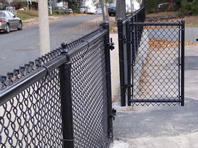 Once tension wire is installed, the chain link fabric may be stretched. Black Coated Vinyl Chain Link Fence Installation, Steps ...
