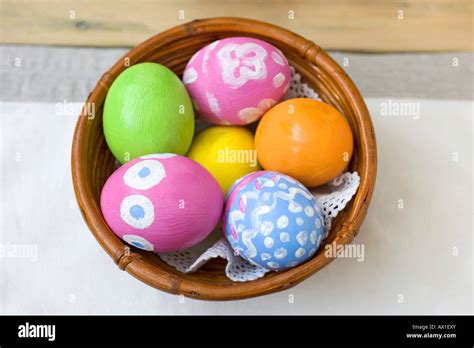 Hand Painted Easter Eggs In A Brown Bamboo Bowl Stock Photo Alamy