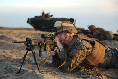 Marine Corps Lance Cpl Shawn Allen Provides Security With His M16
