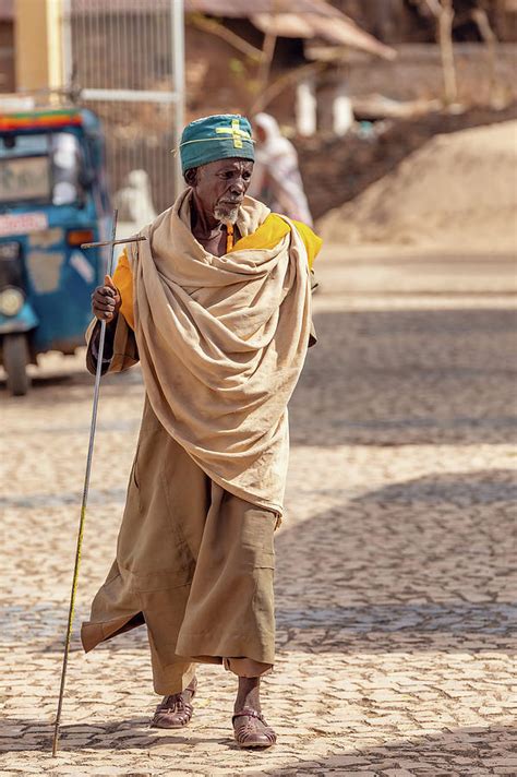 Orthodox Monk Walk On Empty Street Of Aksum Ethiopia Photograph By