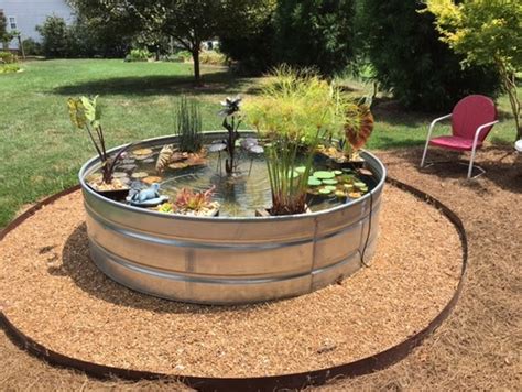 Large galvanized cattle water trough. Two Men and a Little Farm: STOCK TANK POND INSPIRATION ...
