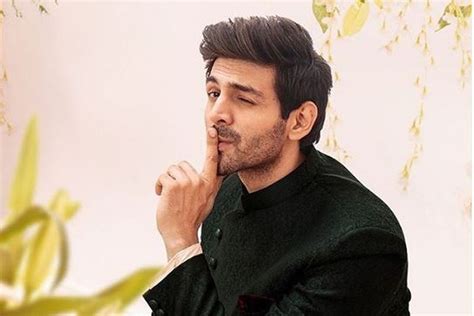 He's making something but i cannot tell what it is yet. Watch | Kartik Aaryan plays with new bff in Himachal