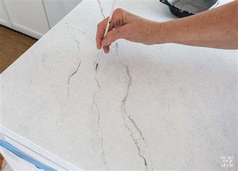 The whole project took about a week altogether, she said, adding that most of the time was spent allowing the layers of paint to dry. Painting Kitchen Countertops To Look Like Carrara Marble ...