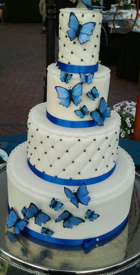 In many cultures, butterflies symbolize new life or change. Blue butterfly wedding cake | Butterfly wedding cake ...