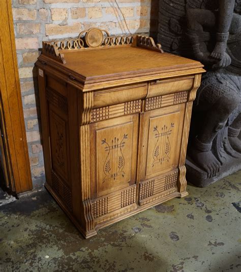 Singer sewing machine model no 66 redeye closed wood cabinet with treadle. Antique Sewing Machine Cabinet w Carved Detail - Salvage One