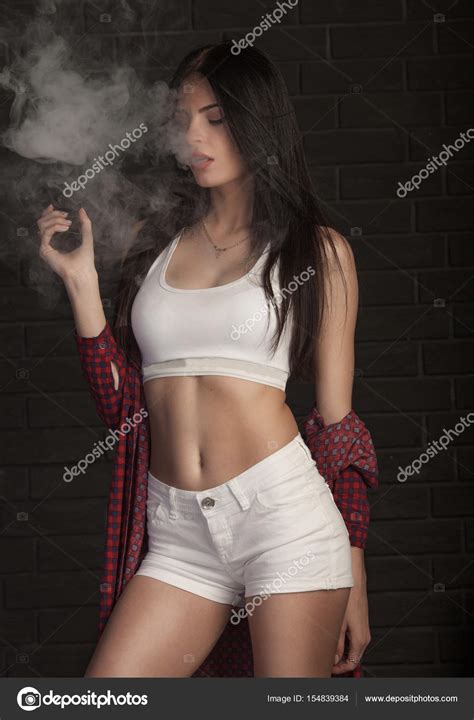 Young Beautiful Brunette Woman Smoking Vaping E Cigarette