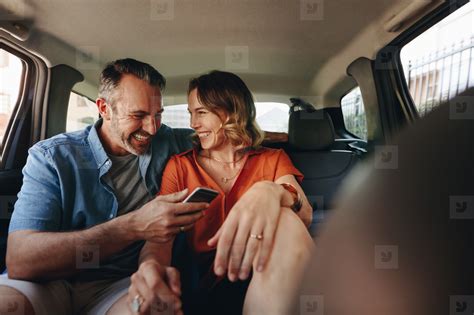 Beautiful Couple In Back Seat Of Car Stock Photo 215015 Youworkforthem