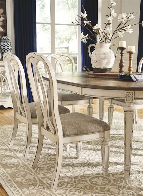 Signature Design By Ashley Dining Room Realyn Upholstered Dining Room
