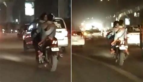 delhi caught on camera couple makes out on moving bike ‘where s the helmet asks netizens