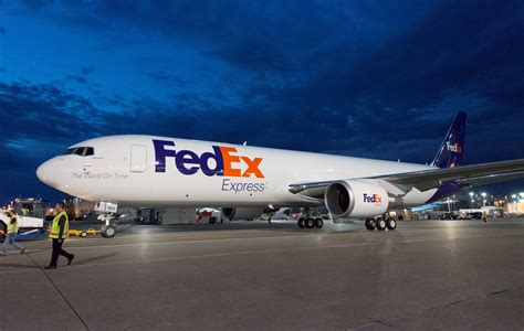 Fedex express delivery vehicle / van with a snowman. Boeing, FedEx Express Announce Order for 24 Medium and Large Freighters.