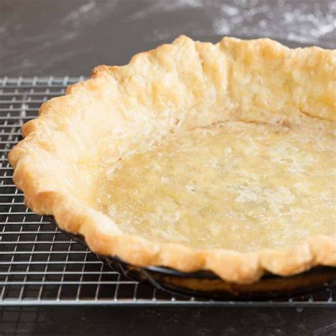 Mix in egg whites carefully. How to Blind Bake a Pie Crust and Prevent Shrinking and ...